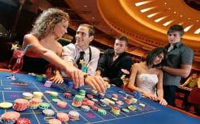 77r live-dealer blackjack and roulette tables on mobile screen